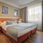 Hotel Aida - Quadruple room (Double bed + Sofa)